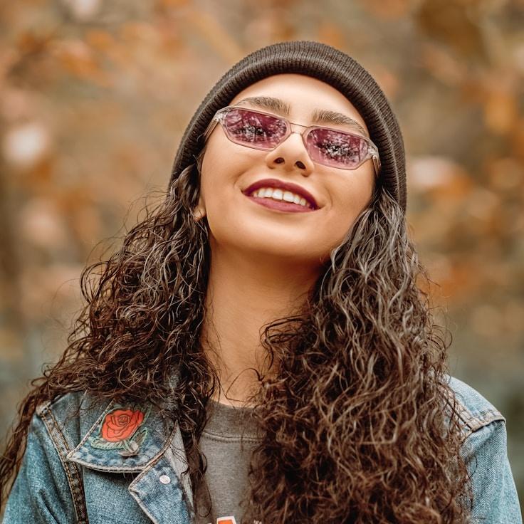 Kaveri Mehta, Lead Design Curator at Cloud Grain Studio, reviewing corporate floral arrangements
